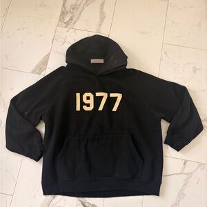 Essentials Black Hoodie with Subtle Print